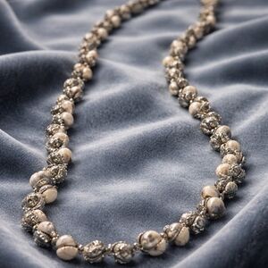 Elegant Silver and Cream Shell Necklace